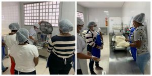 Alunas observam o funcionamento do maquinário